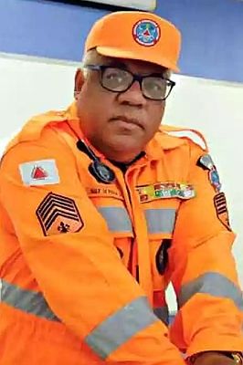 Sergeant wearing Orange Fadigue Dress