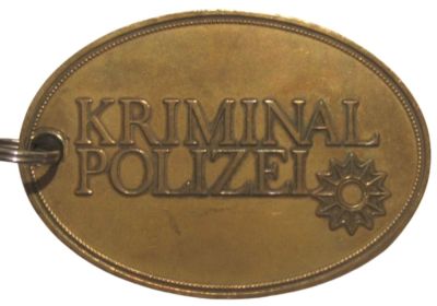 Front of a criminal investigation badge
